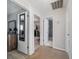 Hallway with carpet flooring, bedroom and bath access at 1825 Se 36Th Pl, Ocala, FL 34471