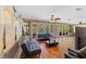 Relaxing sunroom with pool access and comfortable furniture at 1825 Se 36Th Pl, Ocala, FL 34471