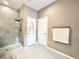 Elegant bathroom with double vanity, shower, and tile floors at 3480 Nw 55Th Ct, Ocala, FL 34482