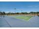 Two well-maintained tennis courts at 4950 Sw 45Th Cir, Ocala, FL 34474