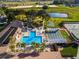Aerial view showing pool, tennis courts, and shuffleboard at 8478 Sw 60Th Ct, Ocala, FL 34476