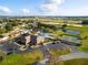 Aerial view of community amenities, including pool and tennis courts at 8478 Sw 60Th Ct, Ocala, FL 34476