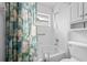 Clean bathroom with shower/tub combo and grab bars at 8478 Sw 60Th Ct, Ocala, FL 34476