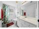 Bathroom with tub shower and updated vanity at 8478 Sw 60Th Ct, Ocala, FL 34476