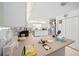 Kitchen counter with built-in microwave and ample workspace at 8478 Sw 60Th Ct, Ocala, FL 34476