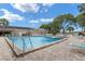 Community pool with spa and lounge chairs at 8478 Sw 60Th Ct, Ocala, FL 34476