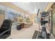 Sunroom with a couch, elliptical machine, and plenty of natural light at 8478 Sw 60Th Ct, Ocala, FL 34476