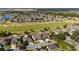 Aerial view of community with golf course and lake at 9551 Sw 70Th Loop, Ocala, FL 34481