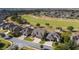 Aerial view of house and neighborhood with golf course at 9551 Sw 70Th Loop, Ocala, FL 34481