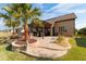 Landscaped backyard with pergola-covered patio and stonework at 9551 Sw 70Th Loop, Ocala, FL 34481