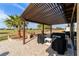 Large covered patio with pergola, pavers, and golf course view at 9551 Sw 70Th Loop, Ocala, FL 34481