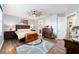 Spacious main bedroom with hardwood floors and large windows at 9551 Sw 70Th Loop, Ocala, FL 34481