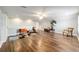 Spacious bonus room with hardwood floors and built-in shelving at 9551 Sw 70Th Loop, Ocala, FL 34481