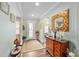 Bright and airy foyer with hardwood floors and elegant decor at 9551 Sw 70Th Loop, Ocala, FL 34481