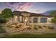 Two-story house with a three-car garage and beautifully landscaped grounds at 9551 Sw 70Th Loop, Ocala, FL 34481