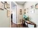 Bright hallway with wood floors and Gathering photos at 9551 Sw 70Th Loop, Ocala, FL 34481
