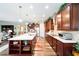 Modern kitchen with large island, stainless steel appliances, and ample cabinetry at 9551 Sw 70Th Loop, Ocala, FL 34481