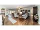Spacious living room with hardwood floors and views to the backyard at 9551 Sw 70Th Loop, Ocala, FL 34481
