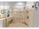 Large walk-in shower with glass enclosure and tiled walls at 9551 Sw 70Th Loop, Ocala, FL 34481