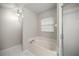 Bathroom with a bathtub, shower, and vanity area at 2401 Se 49Th Ave, Ocala, FL 34480