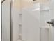 Walk-in shower with built-in shelving at 6357 Sw 98Th Cir, Ocala, FL 34481