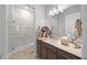 Guest bathroom with a glass shower and single vanity at 9175 Sw 65Th Loop, Ocala, FL 34481