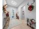 Inviting home entryway with festive holiday decorations at 9175 Sw 65Th Loop, Ocala, FL 34481