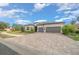 Charming two-story home with a three-car garage and paver driveway at 9175 Sw 65Th Loop, Ocala, FL 34481