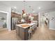 Spacious kitchen with large island, pendant lighting, and stainless steel appliances at 9175 Sw 65Th Loop, Ocala, FL 34481