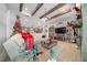 Cozy living room with a decorated Christmas tree, fireplace, and built-in shelves at 9175 Sw 65Th Loop, Ocala, FL 34481
