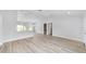 Open living room, dining, and kitchen area at 10178 Sw 137 Ave, Dunnellon, FL 34432