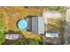 Aerial view showing house, pool, shed, and RV parking at 2981 Se 140Th Ln, Summerfield, FL 34491