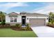 One-story home with two-car garage and landscaped yard at 4086 Nw 48Th Terrace Rd, Ocala, FL 34482