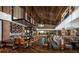 Long bar with rustic finishes in community clubhouse at 4122 Nw 48Th Terrace Rd, Ocala, FL 34482