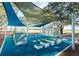 Outdoor fitness area with shade structures and various equipment at 4122 Nw 48Th Terrace Rd, Ocala, FL 34482