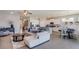 Open living space with kitchen and comfortable seating at 8552 Pinecrest Trl, Wildwood, FL 34785