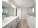 Bathroom with double vanity and glass shower at 9781 Sw 79Th Lane Rd, Ocala, FL 34481