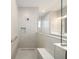 Bathroom with a walk-in shower, built-in seat, and glass enclosure at 9781 Sw 79Th Lane Rd, Ocala, FL 34481