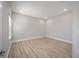 Spacious bedroom with double door closet and wood-look floors at 9781 Sw 79Th Lane Rd, Ocala, FL 34481