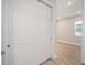 Bedroom with sliding door and light wood flooring at 9781 Sw 79Th Lane Rd, Ocala, FL 34481