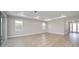 Open living room with vinyl flooring, recessed lighting and views to entryway at 9781 Sw 79Th Lane Rd, Ocala, FL 34481