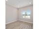 Bright office space with large window and wood-look floors at 9781 Sw 79Th Lane Rd, Ocala, FL 34481