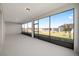 Screened porch with view of backyard and neighborhood at 9781 Sw 79Th Lane Rd, Ocala, FL 34481