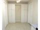 Large pantry or storage room with plenty of white cabinets at 11388 Sw 139Th St, Dunnellon, FL 34432