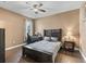 Cozy bedroom featuring a double bed and a workspace at 1166 Cr 441, Lake Panasoffkee, FL 33538