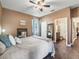 Large bedroom with a king bed and en-suite bathroom at 1166 Cr 441, Lake Panasoffkee, FL 33538
