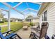 Peaceful screened patio perfect for outdoor relaxation at 13746 Se 88Th Ave, Summerfield, FL 34491