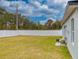 Private fenced backyard with a patio area and lush lawn at 15720 Sw 19Th Ter, Ocala, FL 34473