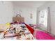 Charming room with a cozy bed, playful decorations, and ample natural light at 15720 Sw 19Th Ter, Ocala, FL 34473