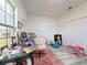 Another perspective of the home office showcasing the workspace and storage solutions at 15720 Sw 19Th Ter, Ocala, FL 34473